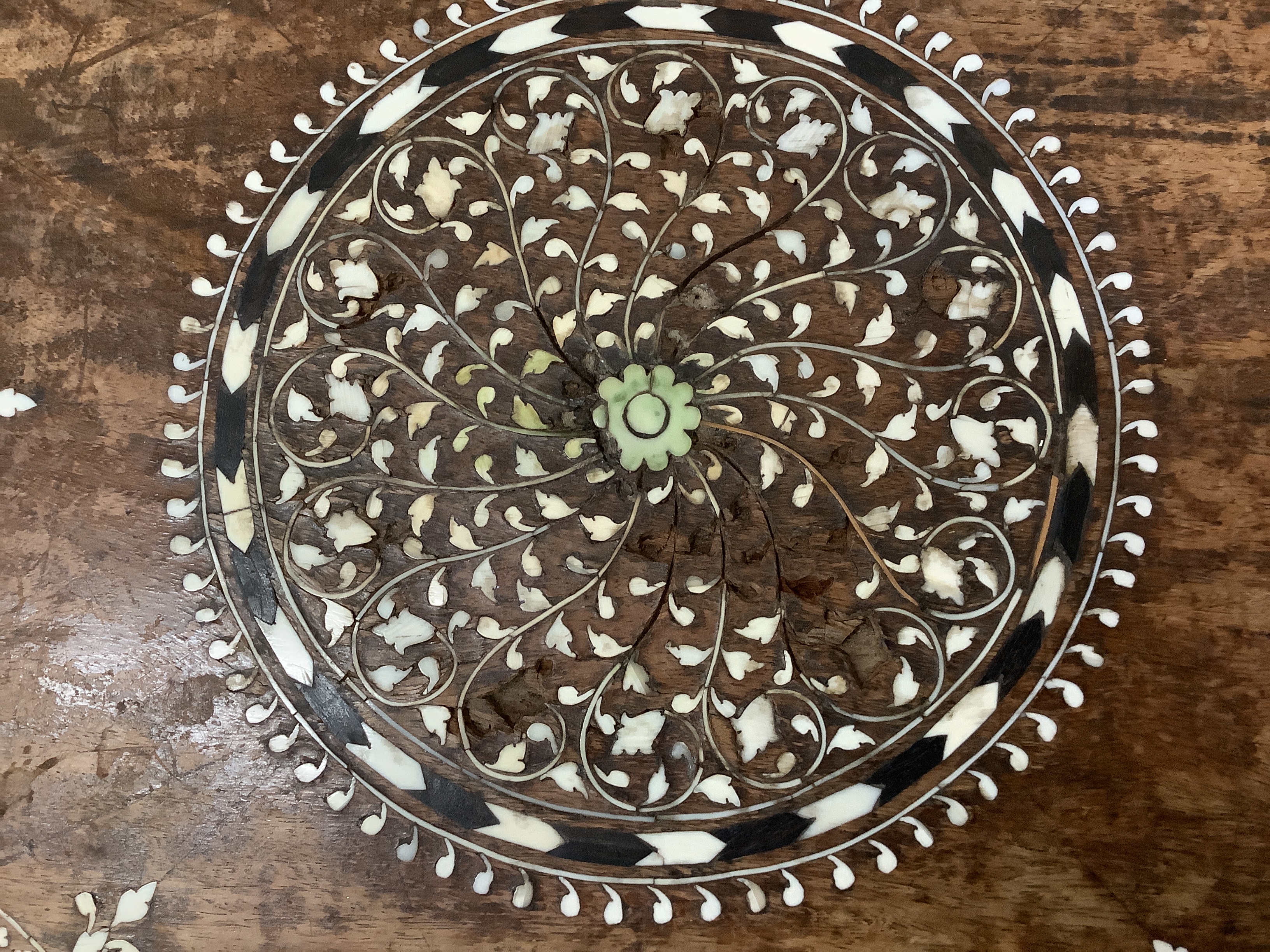 A 19th century Indian Hoshiarpur brass mounted octagonal bone inlaid table, fitted two drawers on turned legs, width 62cm, height 62cm